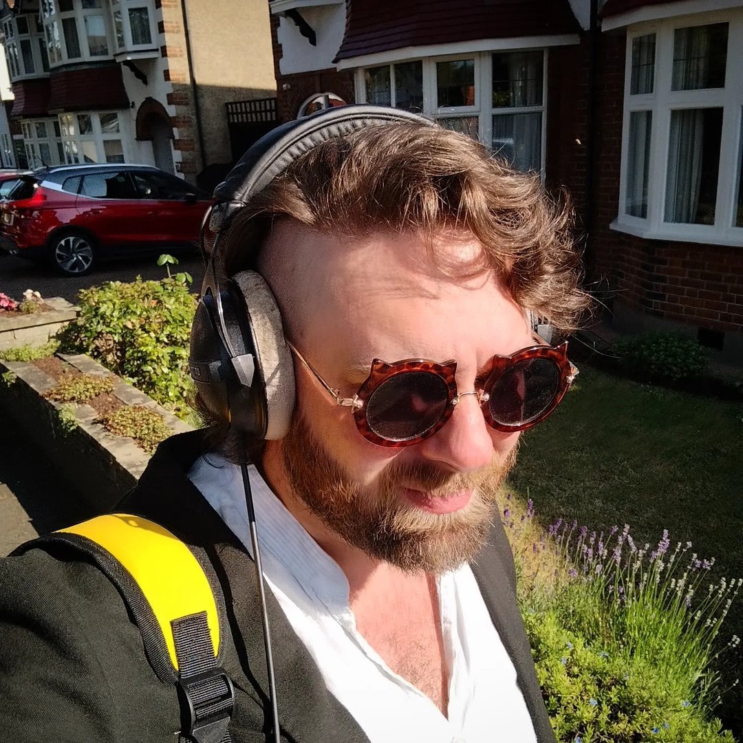 Nico heading to work. Bad sunglasses: optional.